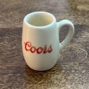 miniature Coors beer stein.